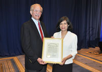 Madhu Agarwal, M.D., M.P.H., Deputy Under Secretary for Health for Policy and Services and Seth Eisen, M.D., M.Sc., Director of HSR&D, recipient of the Under Secretary for Health's Exemplary Service Award
