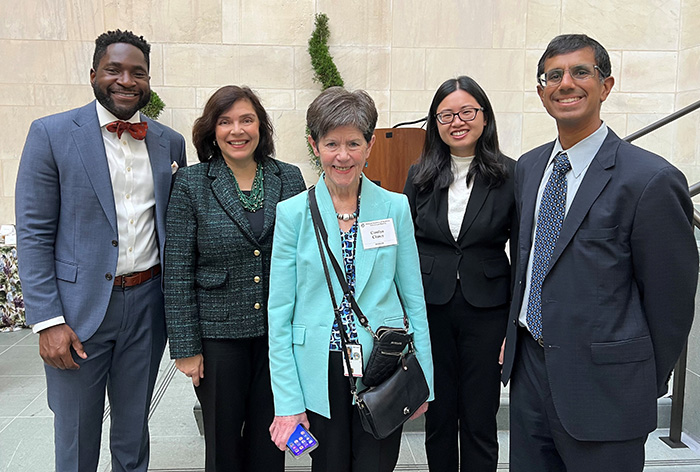Carolyn Clancy, MD (center) poses at NAM's 2024 annual meeting with HSR NAM fellows (l to r) Utibe Essien,MD, MPH; A. Rani Elwy, PhD, MSc; Lucinda Leung, MD, PhD, MPH; and Sanket Dhruva, MD, MHS
