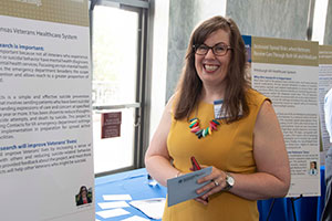 Sara Landes, PhD with her research presentation at VA Research Day on the Hill. 