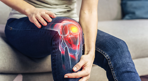 VFX Joint and Knee Pain Augmented Reality Render. Close Up of a Person Experiencing Discomfort in a Result of Leg Trauma or Arthritis. Massaging the Muscles to Ease the Injury.   