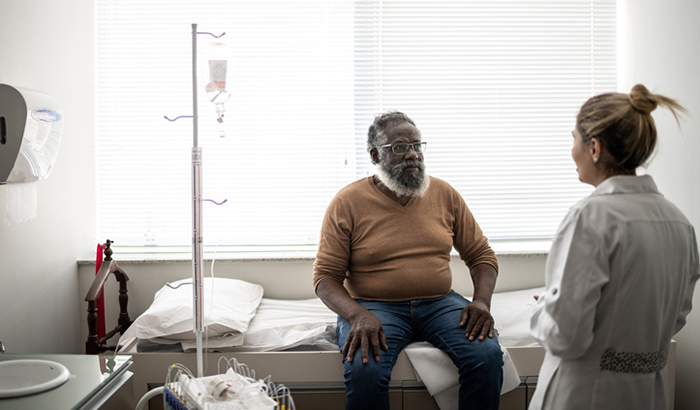 Doctor talking to patient on medical appointment. 