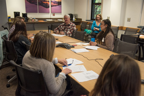 Members of the CIVIC Veteran Engagement Group for Research meet with CIVIC study team