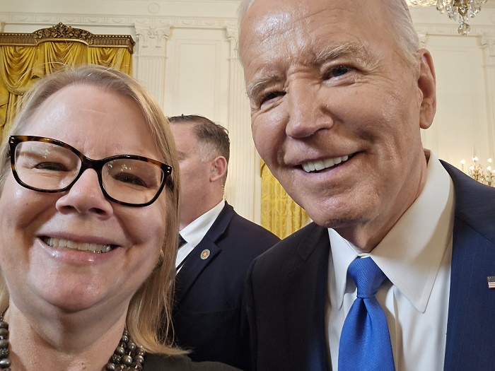 Elizabeth Yano (left) and President Biden at the White House.