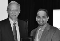 Dr. Seth Eisen (left) with Article of the Year awardee, Dr. Amal Trivedi (right).